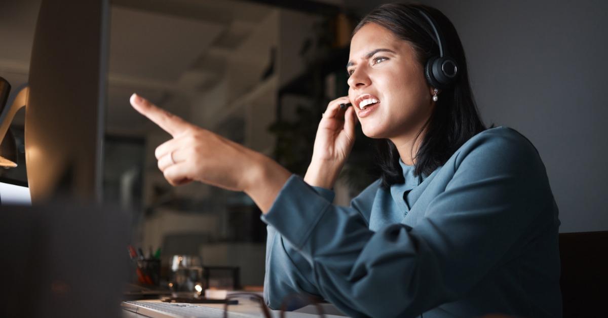 female looking at her computer monitor in confusing manner