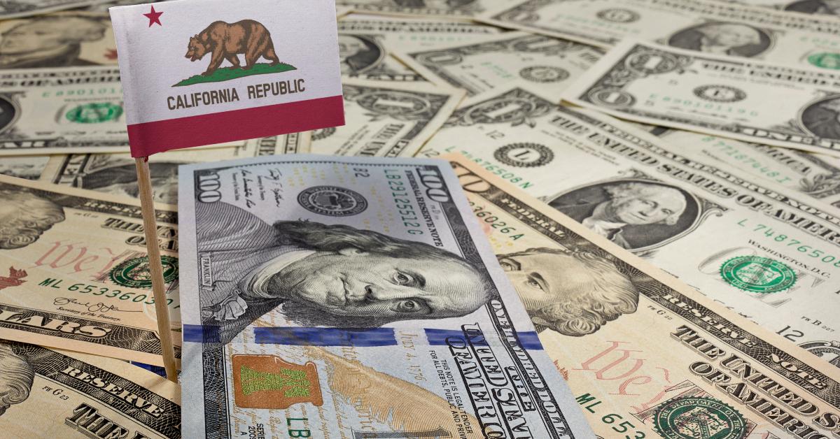 flag of California sticking in various american banknotes