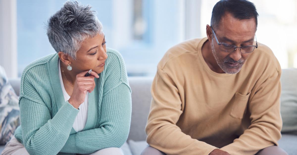 couple discussing about documents at home