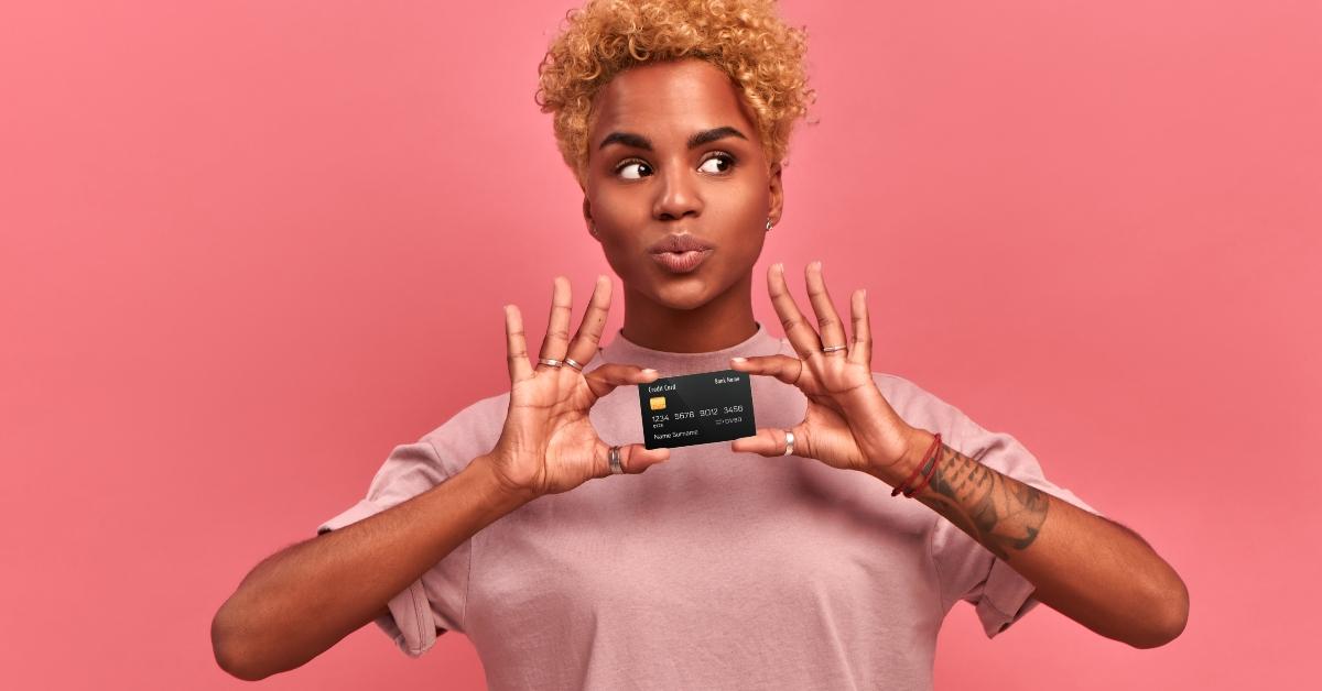 woman holding a credit card
