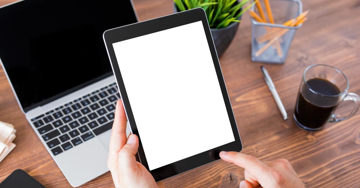 man working on tablet computer