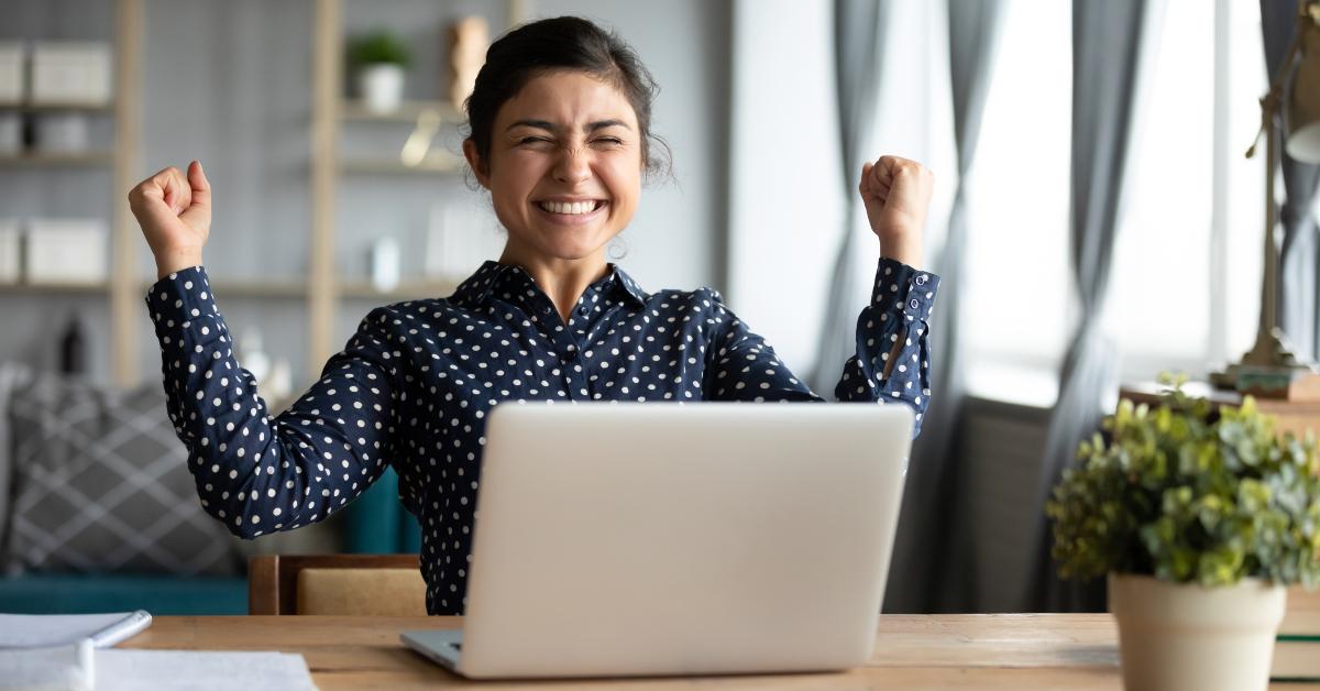 overjoyed woman triumph reading good news