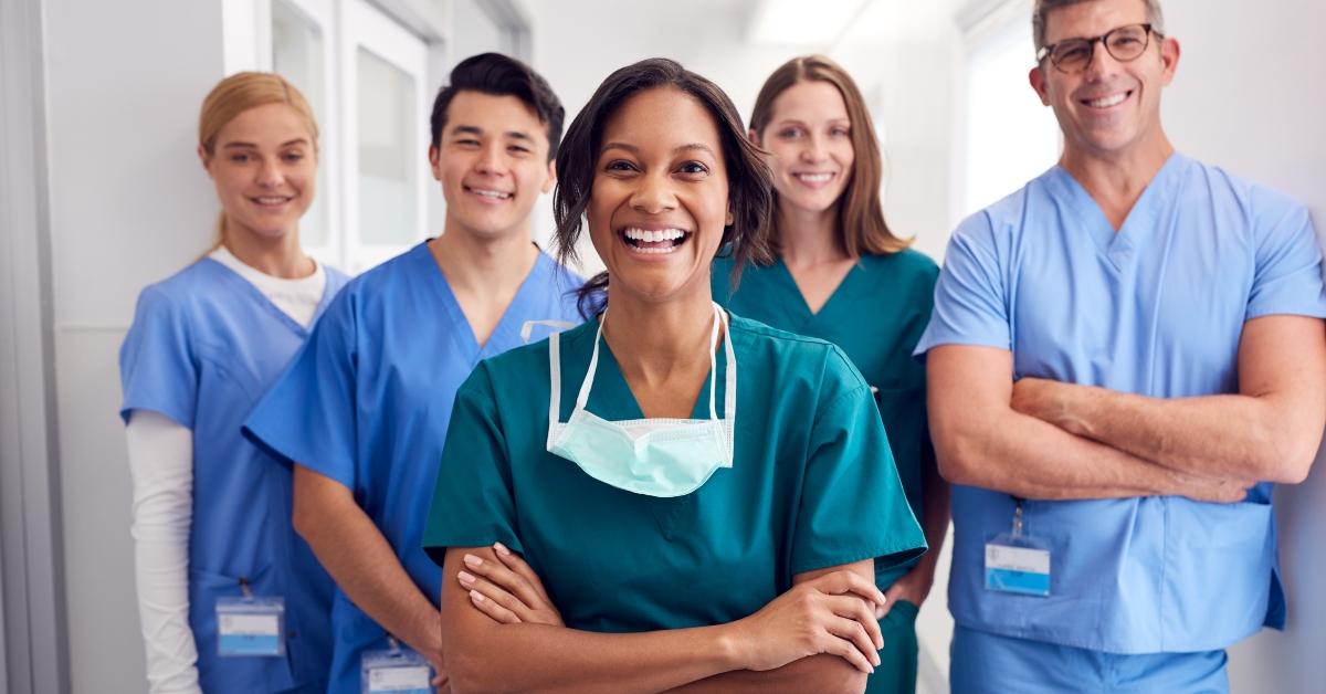medical team standing in hospital corridor