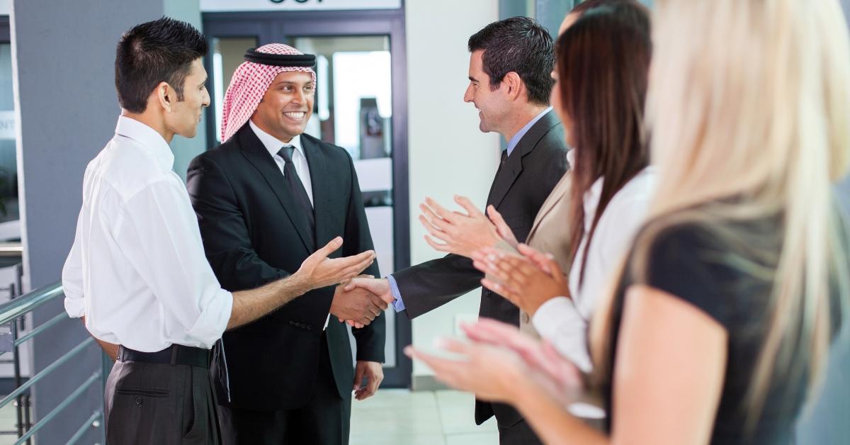 translator introducing arabian businessman