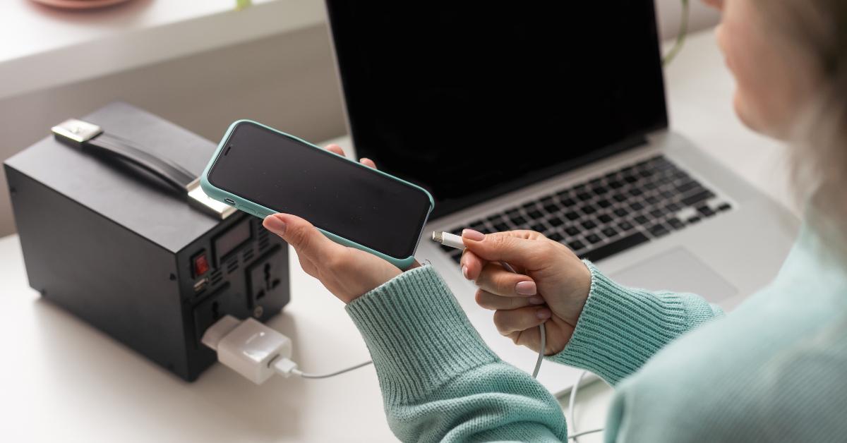 female hands with mobile phone
