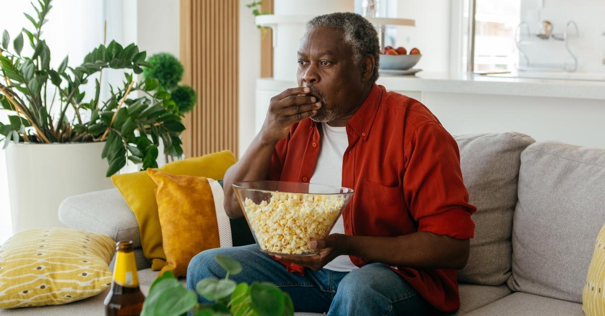 senior pensioner sitting at his cozy home