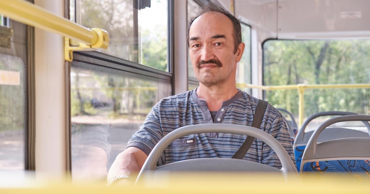  senior Asian man in tram