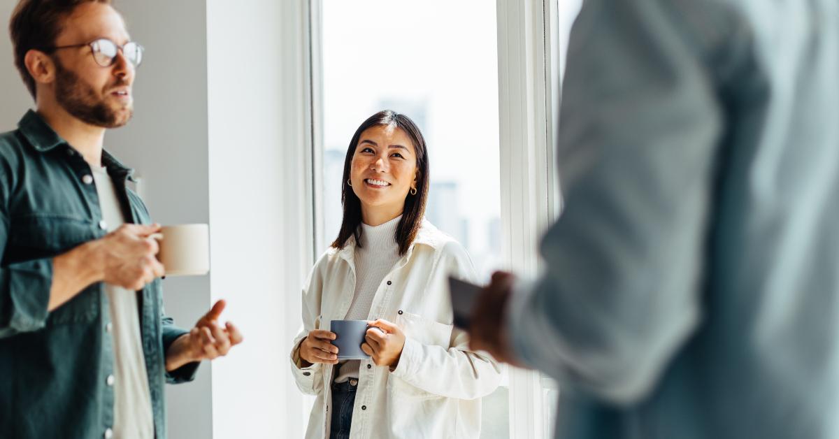business professionals having a coffee break in an office