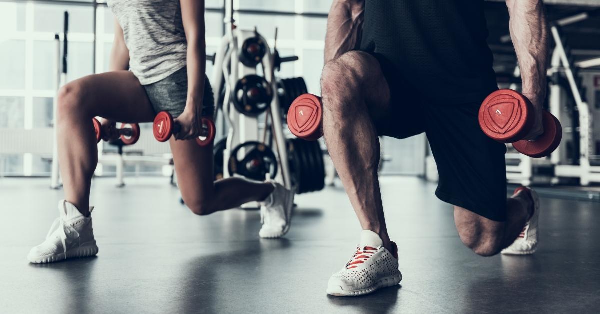 man and woman training in a fitness club