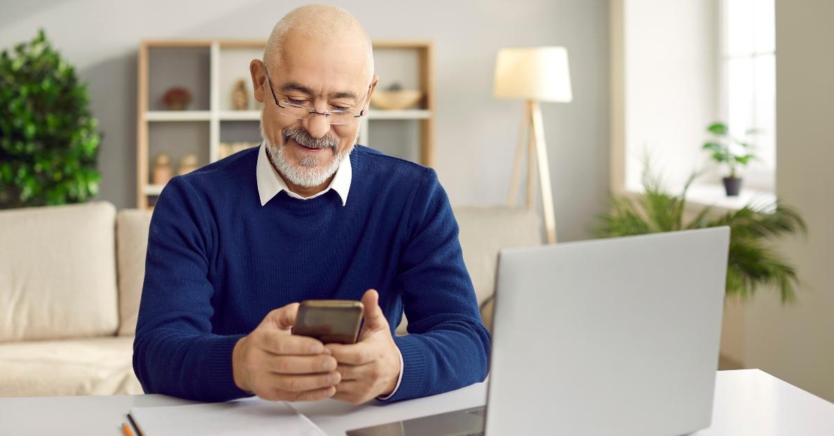 senior man using mobile phone