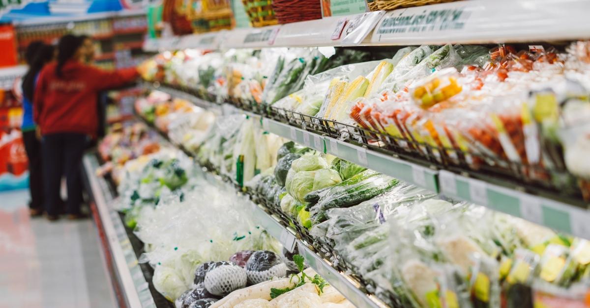 fresh vegetables and fruits on shelf in supermarket