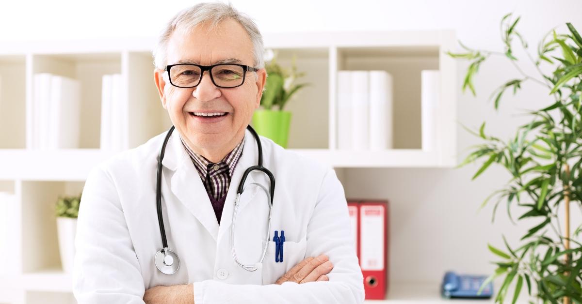 smiling senior doctor in the hospital