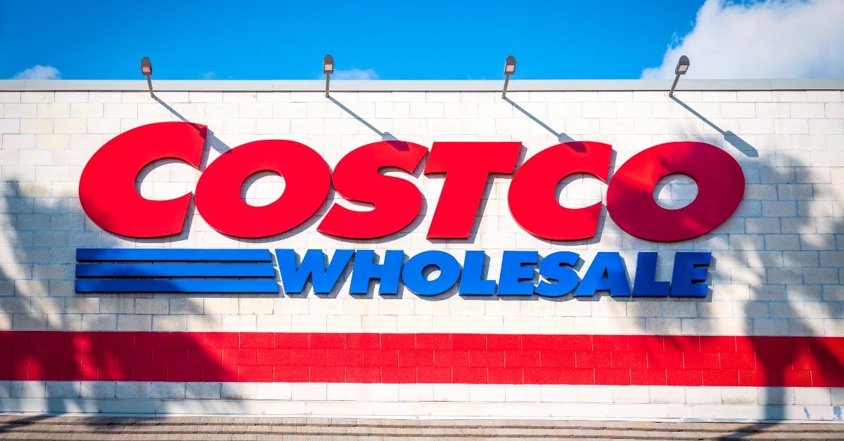 COSTCO exterior signage with palm tree shadow