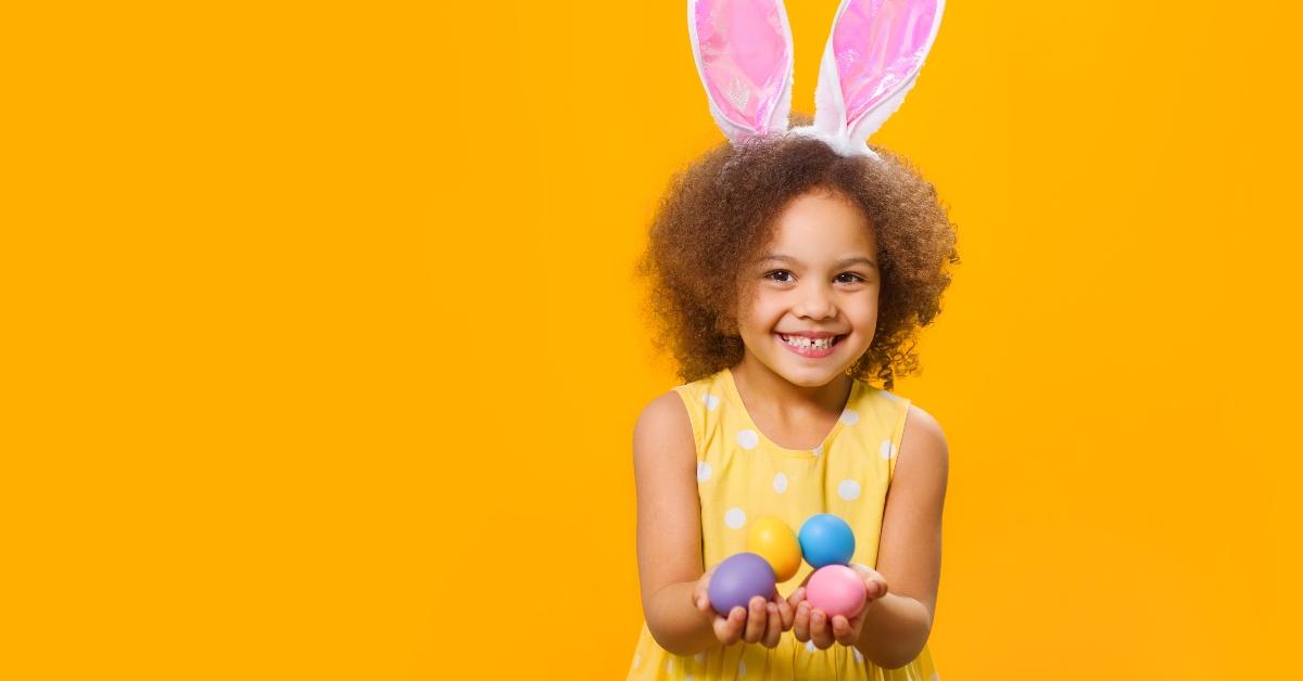 girl in sunny orange dress with rabbit ears