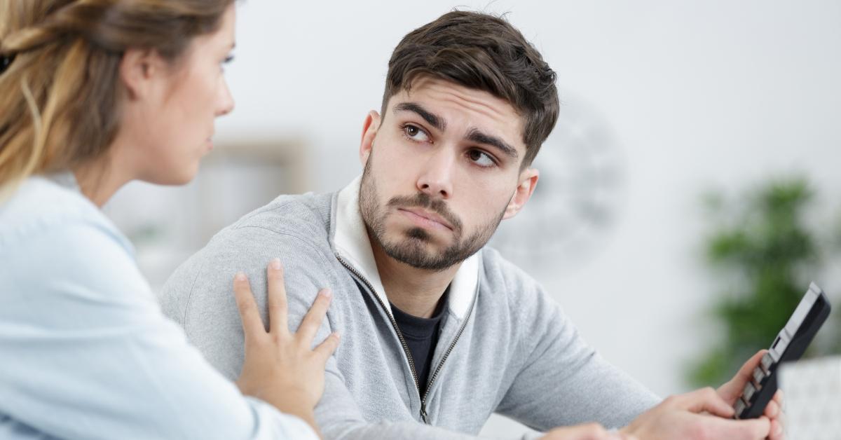 woman and man paying taxes together
