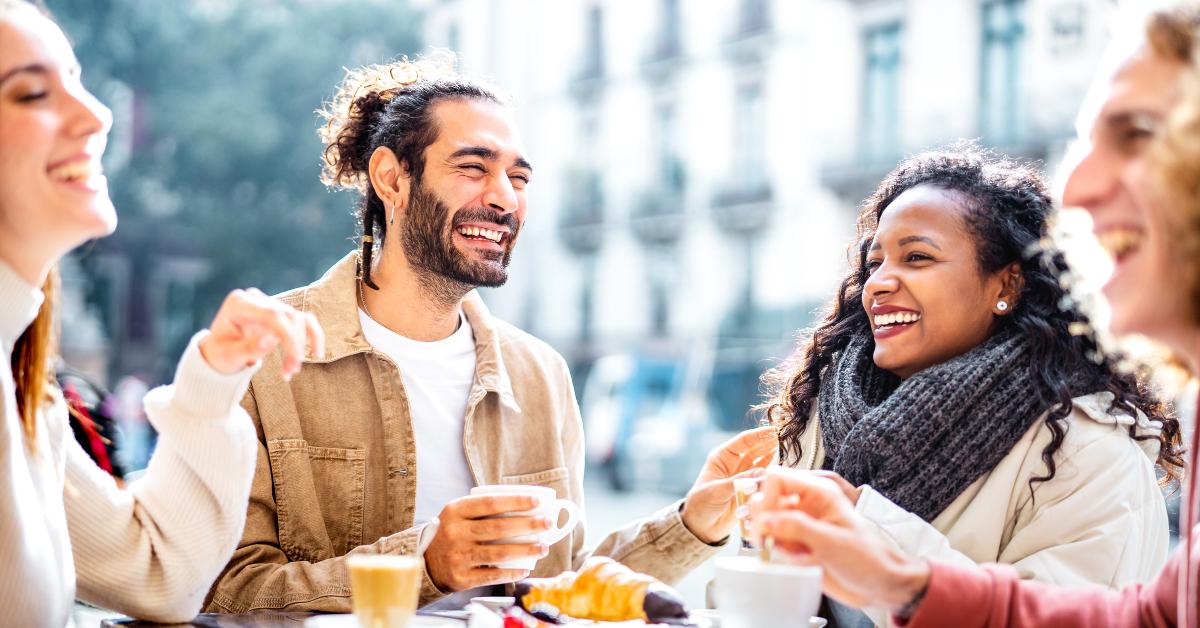 couples drinking cappuccino at coffee bar