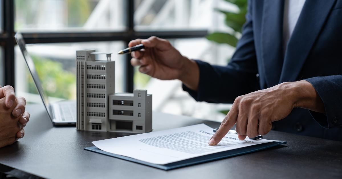 insurance agent explains the details of the condo purchase 