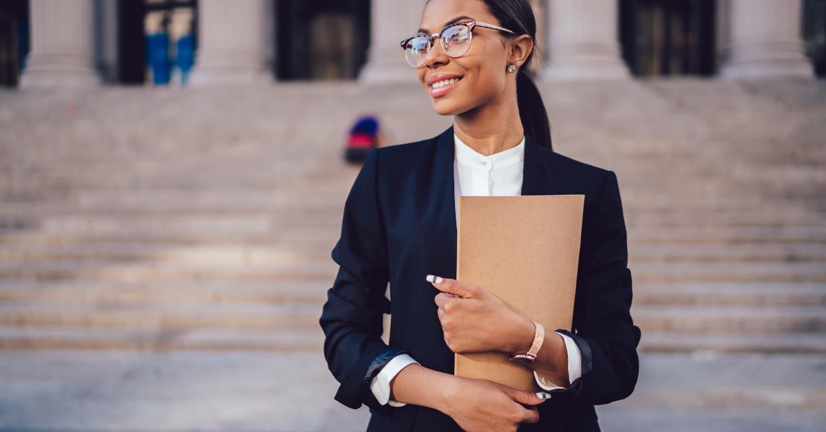 juridical specialist standing outdoors 