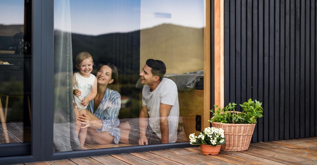 young family with small daughter indoor 