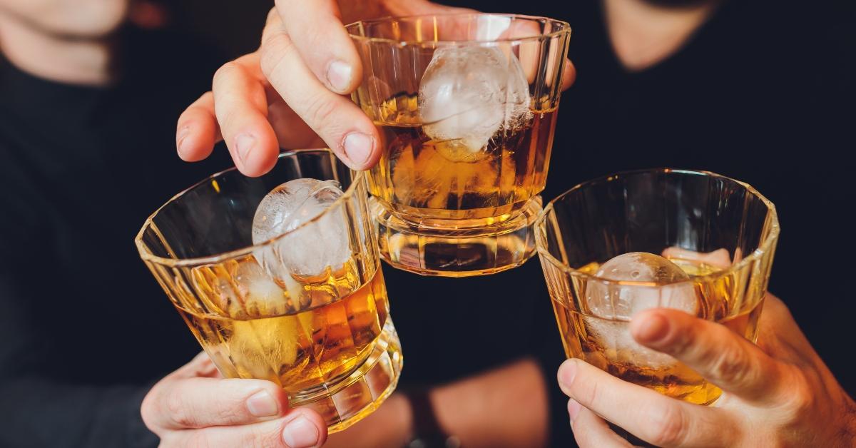 glasses with alcohol and toasting