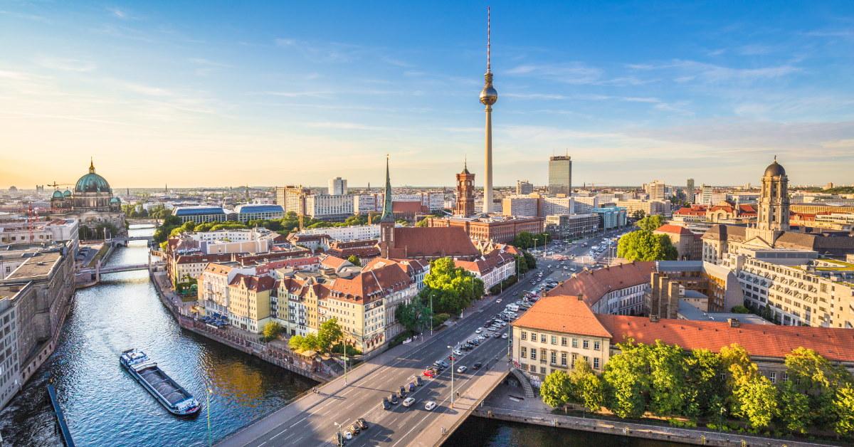berlin skyline with tv tower and spree river during day time in germany