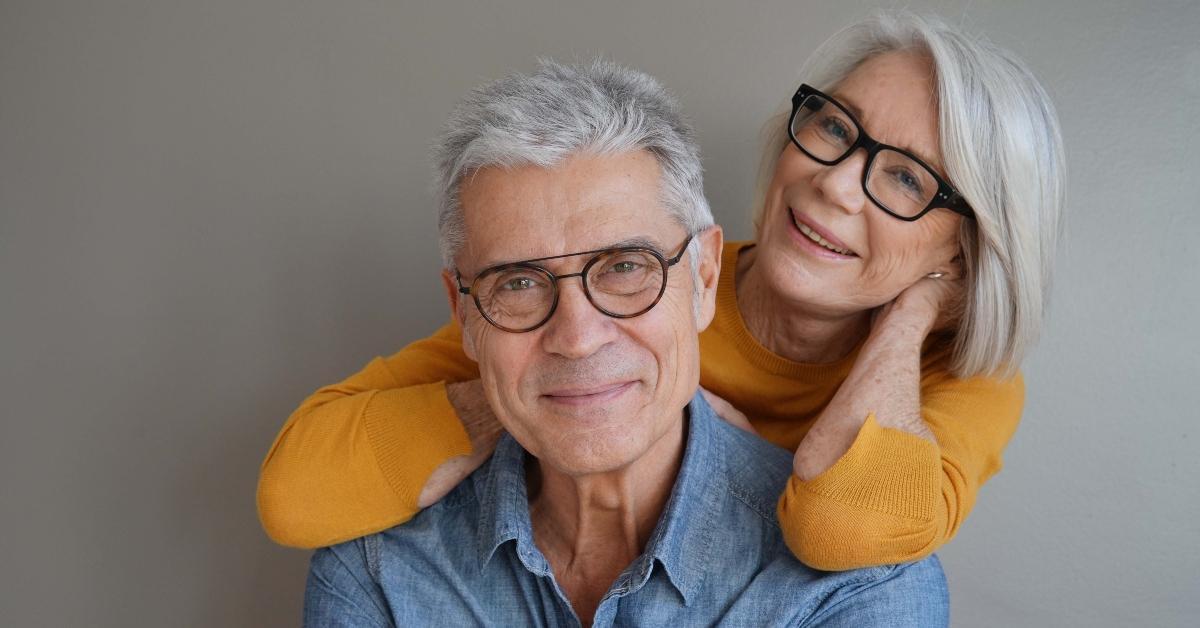 relaxed fun senior couple wearing glasses