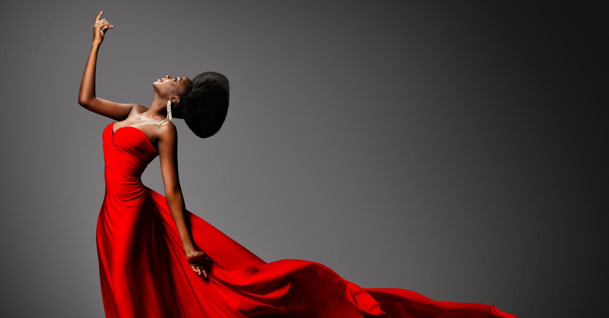 dark skinned model with black afro hair 