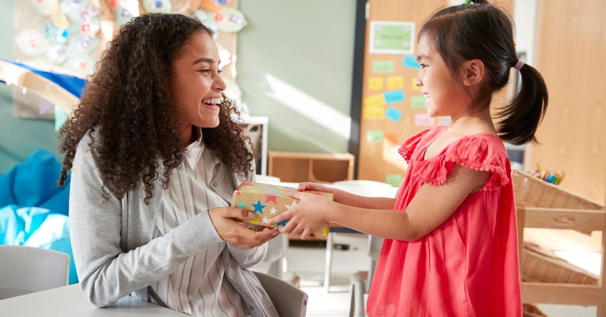 A teacher getting a gift