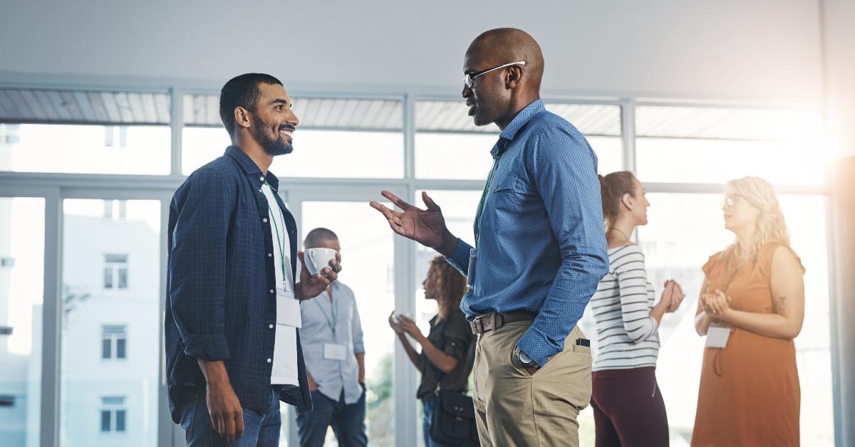 men talking at networking event