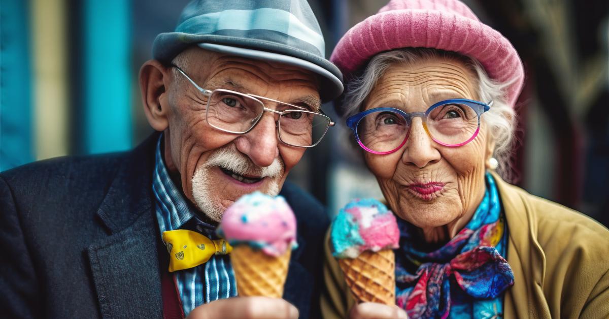 fashionable senior couple eating icecream