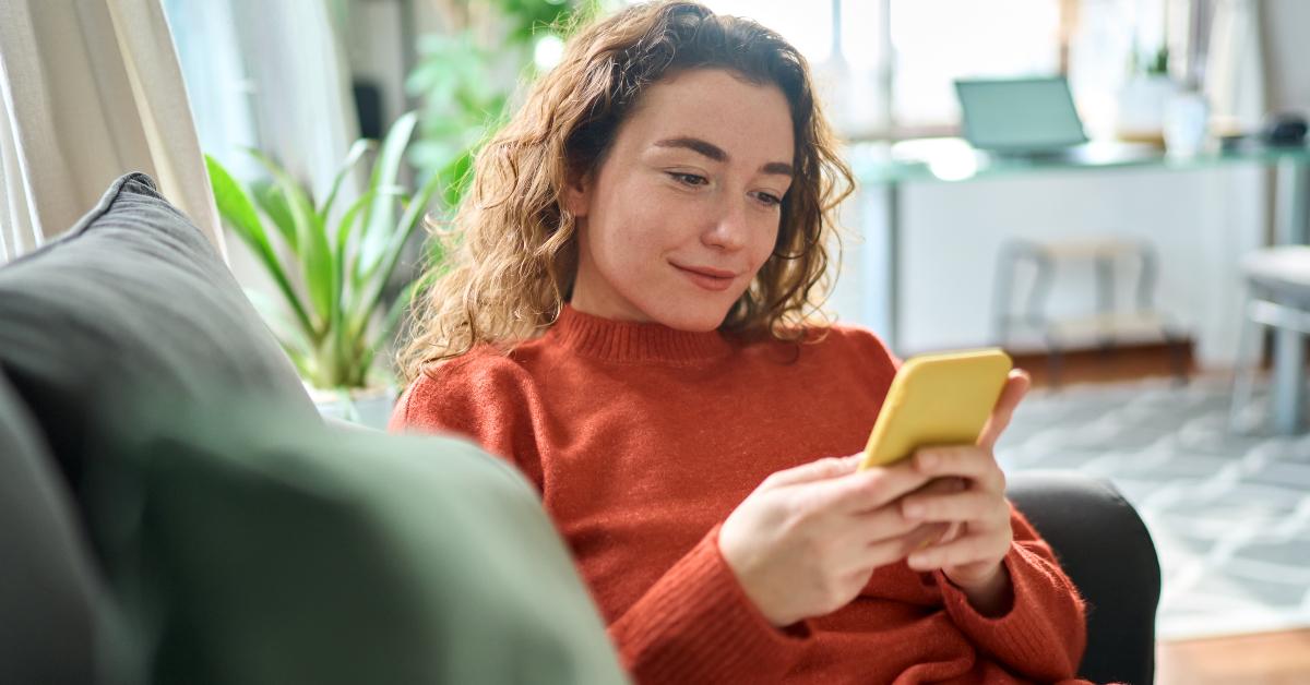 woman sitting on couch