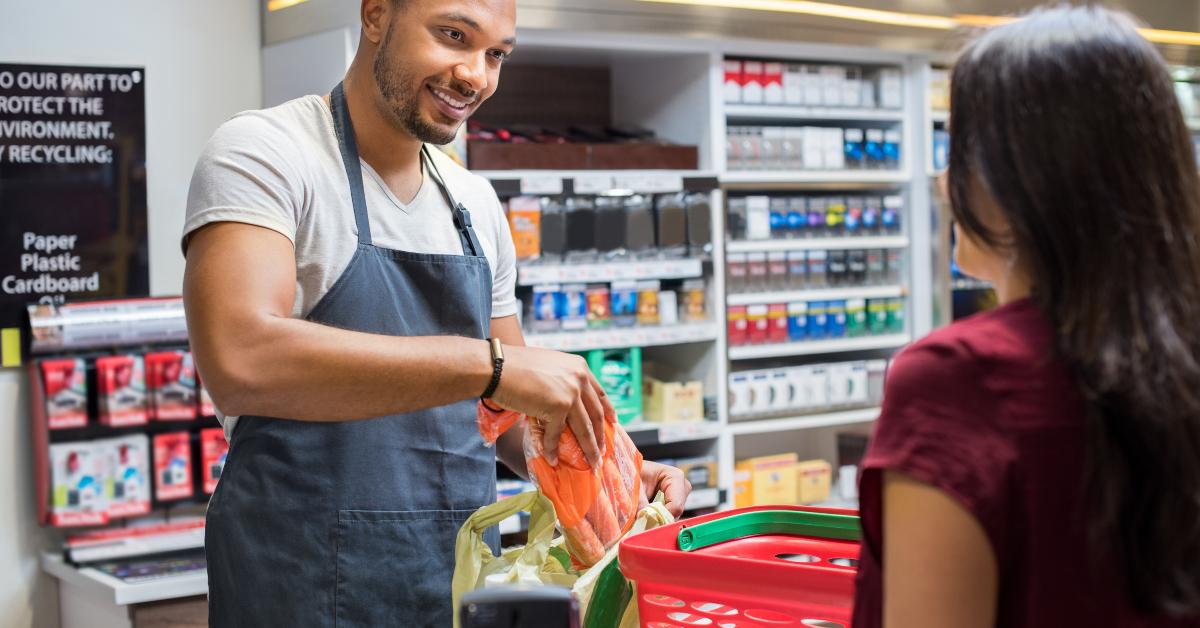 Cashier working at supermarket