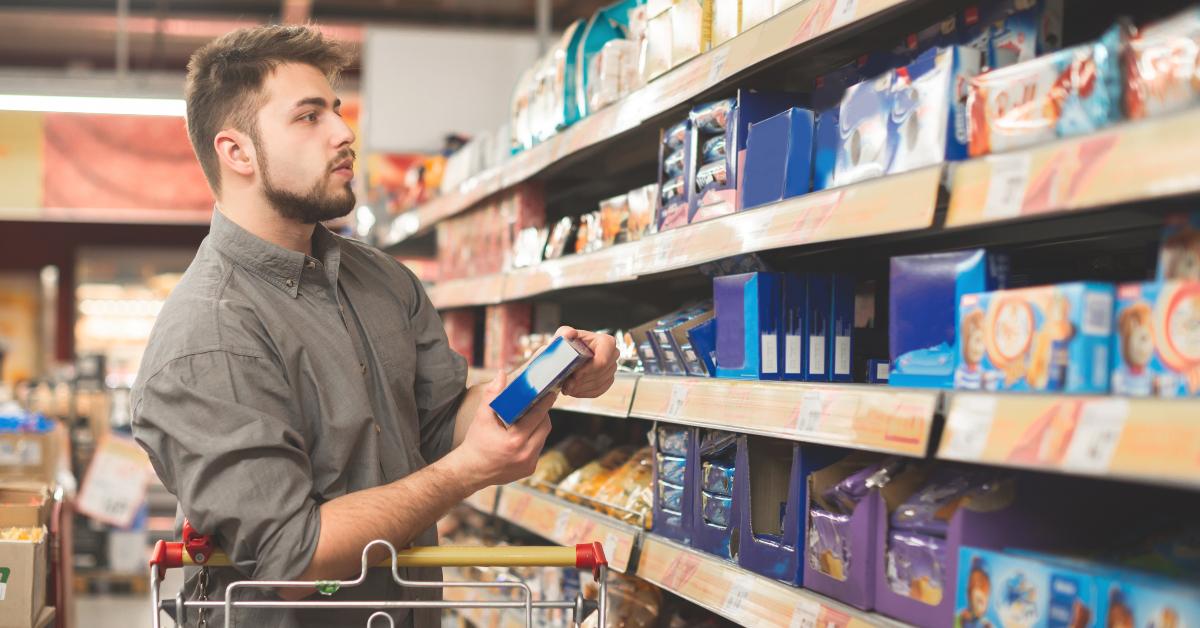 Man stands in a supermarket