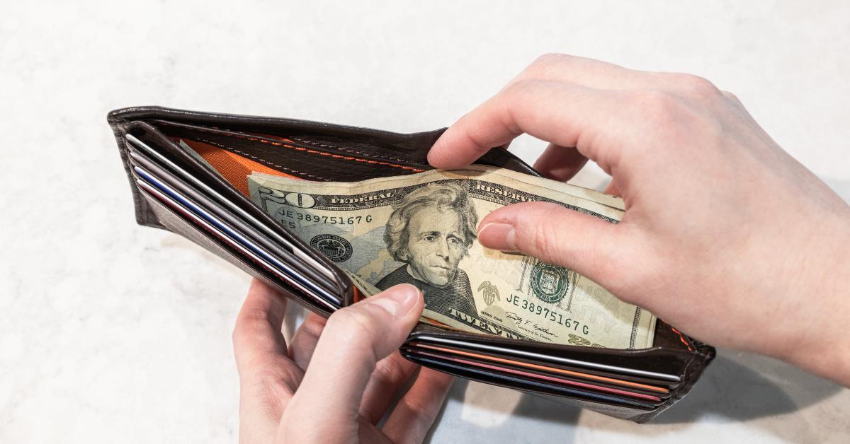 banknote inside brown wallet