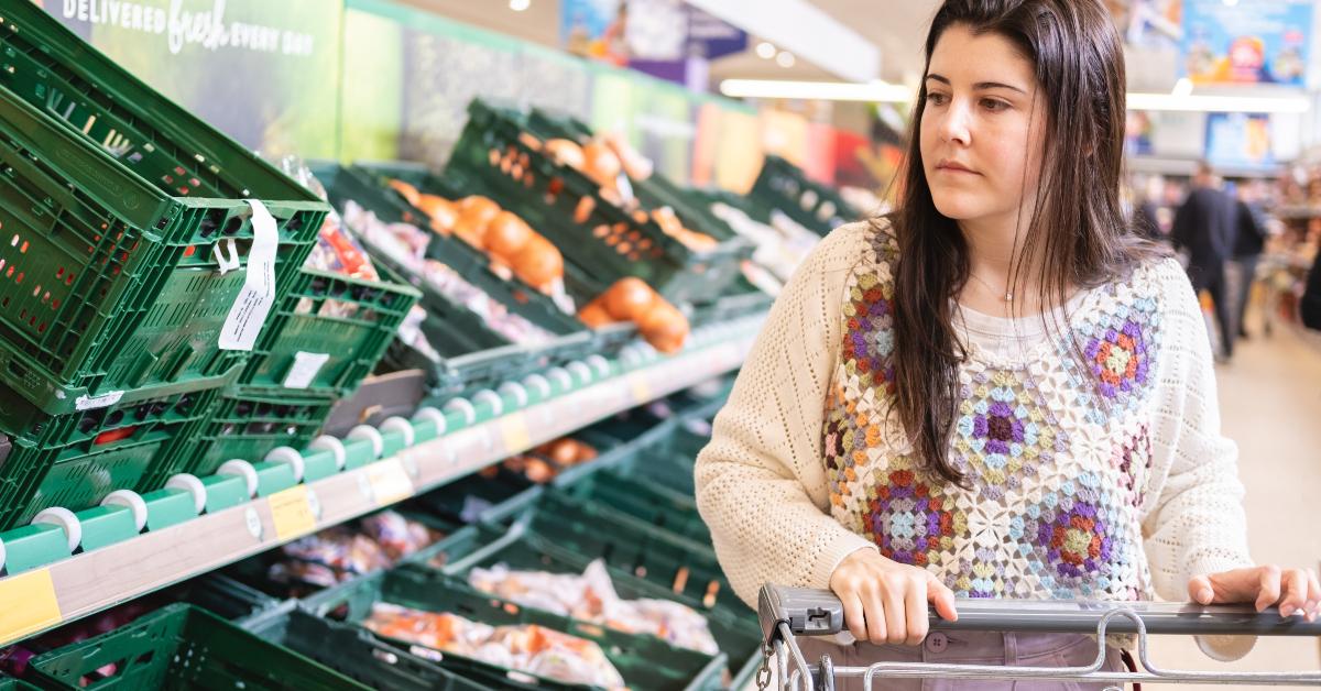 mother buying food at the supermarket