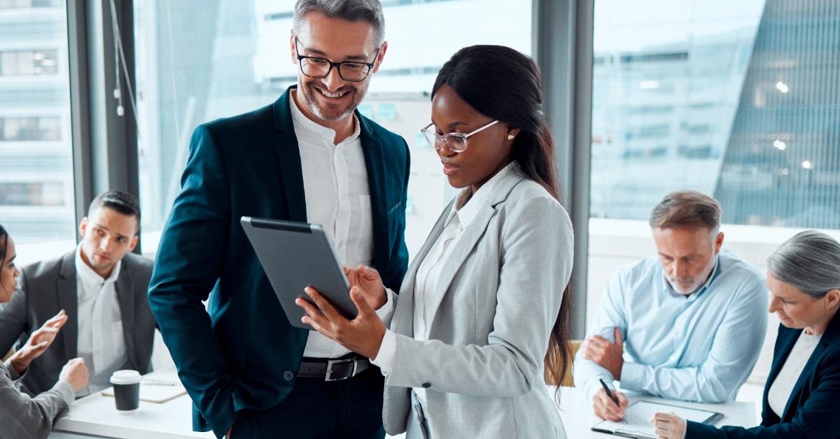 Employee showing project to CEO