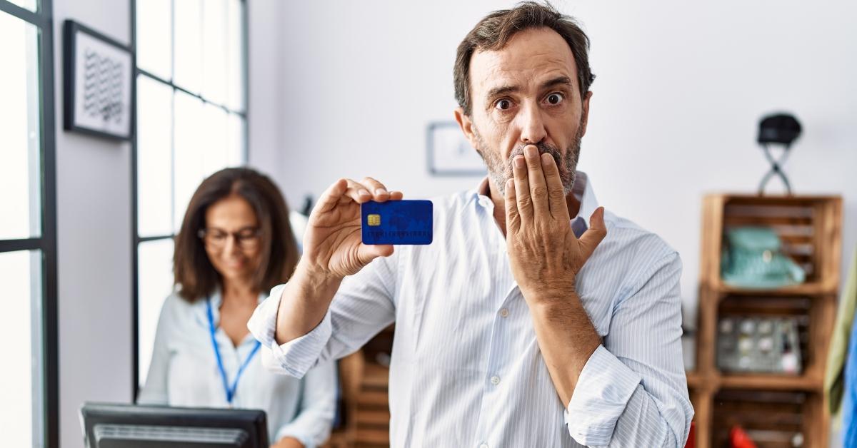 man holding credit card