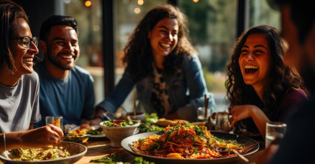 friends sharing laughter and tacos