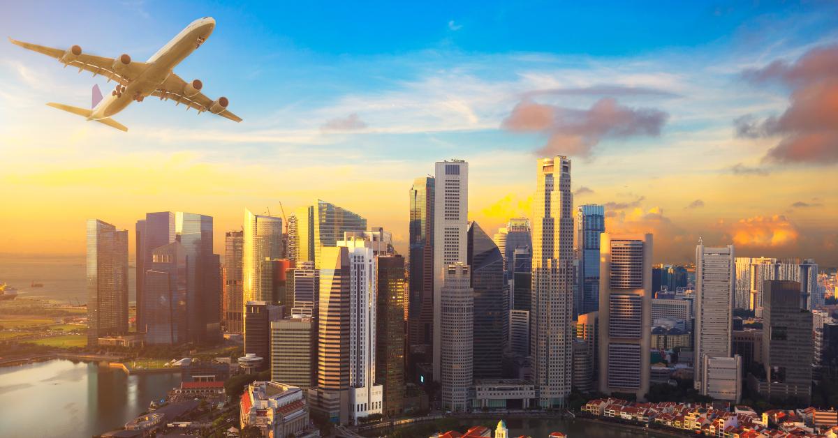 airplane flying over singapore