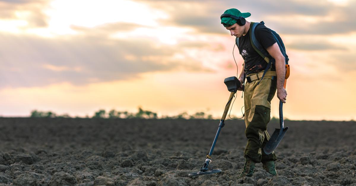 metal detector in a field