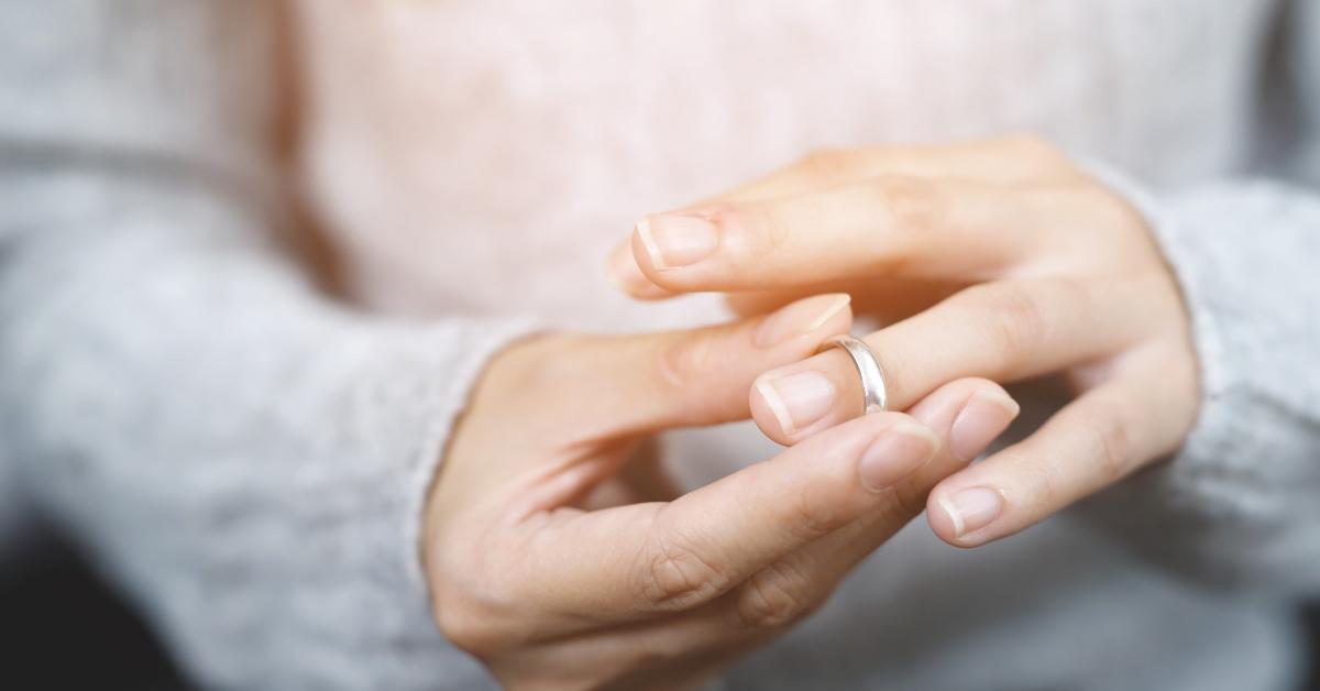 wife holding the wedding ring