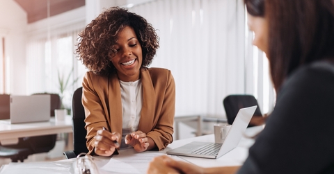 Woman talking with financial advisor
