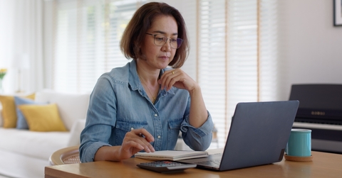 Woman contemplating her finances