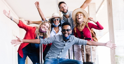 Group of friends having fun in an airport