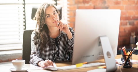 Woman looking at computer