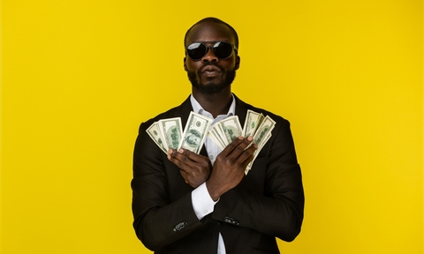 man holding a lot of cash