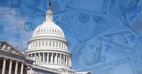 Picture of the government buildings with money in the background