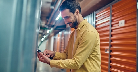 Man opening storage unit