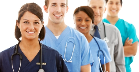 Several nurses standing in line
