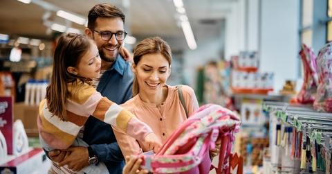 Family buying a backpack